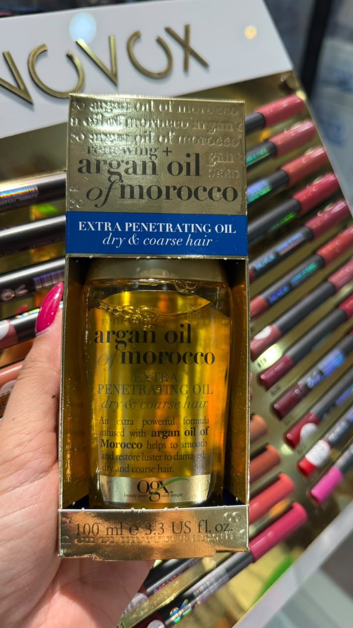 روغن مو جی ایکس مدل Argan حجم 100 میلی لیتر مناسب موهای خشک و آسیب دیده